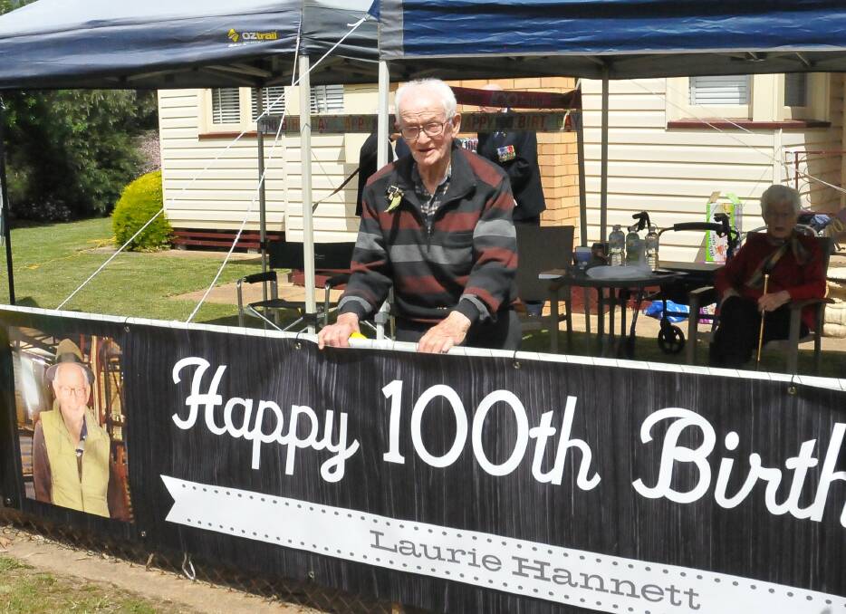 DRIVE BY CELEBRATIONS: Laurie Hannett waited at his fence as the cars drove past for his birthday. Picture: CASSANDRA LANGLEY