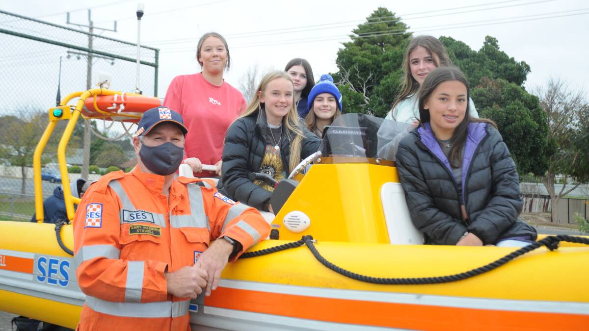 INSIGHT: SES volunteer Gary Raeburn demonstrated to the students the parts of the SES rescue boat.