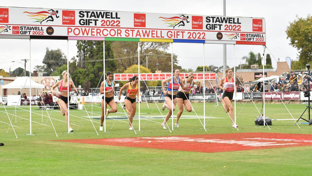 WINNER: Queensland's Carla Bull in blue claimed the 2022 women's Stawell Gift. Picture: KARL MEYER