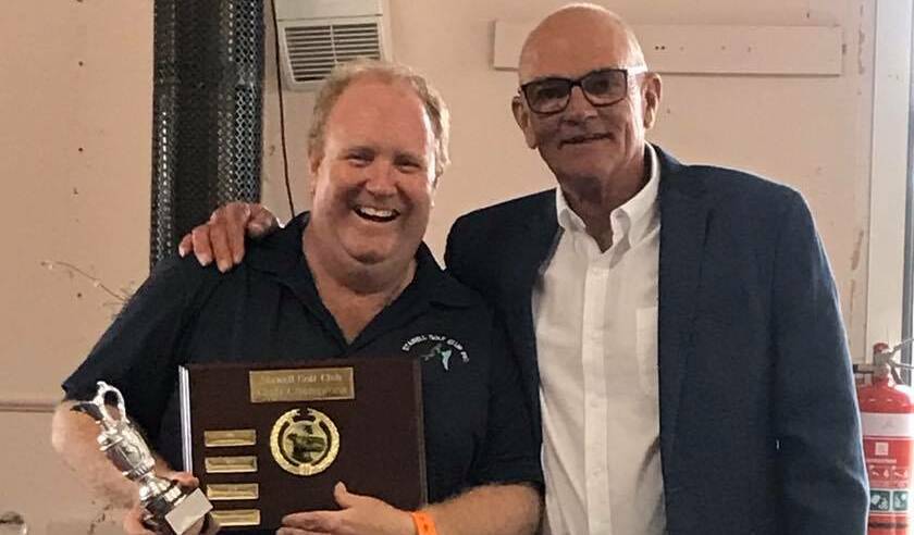 CHAMPION: Matt Dalton with Stawell Golf Club's co-captain Greg Earle presenting him is award. Pictures: CONTRIBUTED