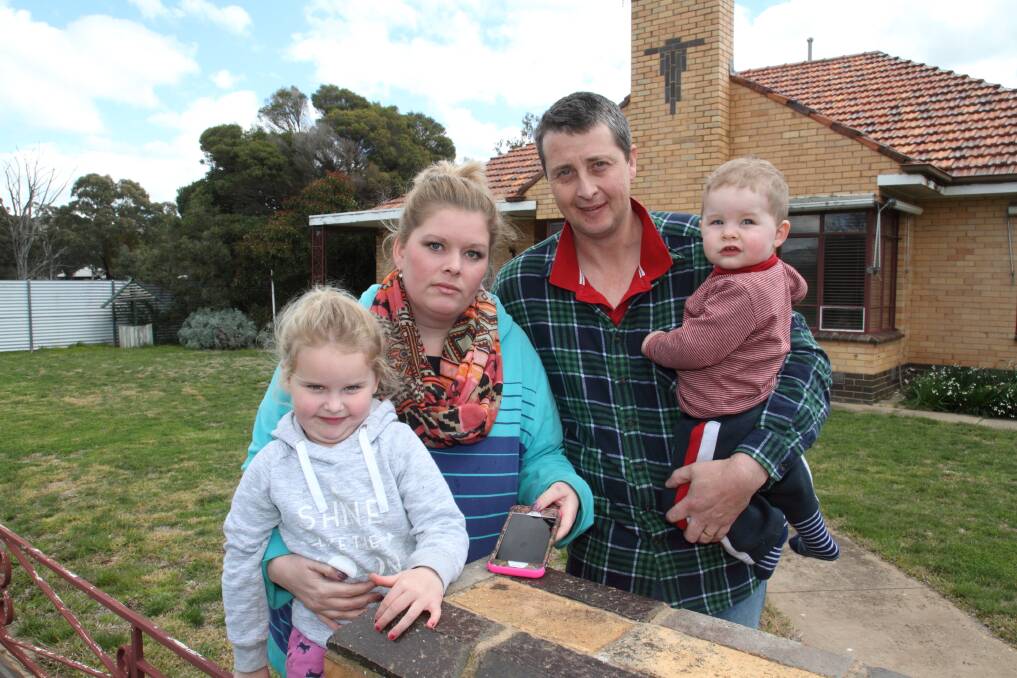 CONCERNS: Charlene and Scott McPhan, with their children Charlott and Mark, are concerned about phone coverage at Landsborough. Picture: PETER PICKERING