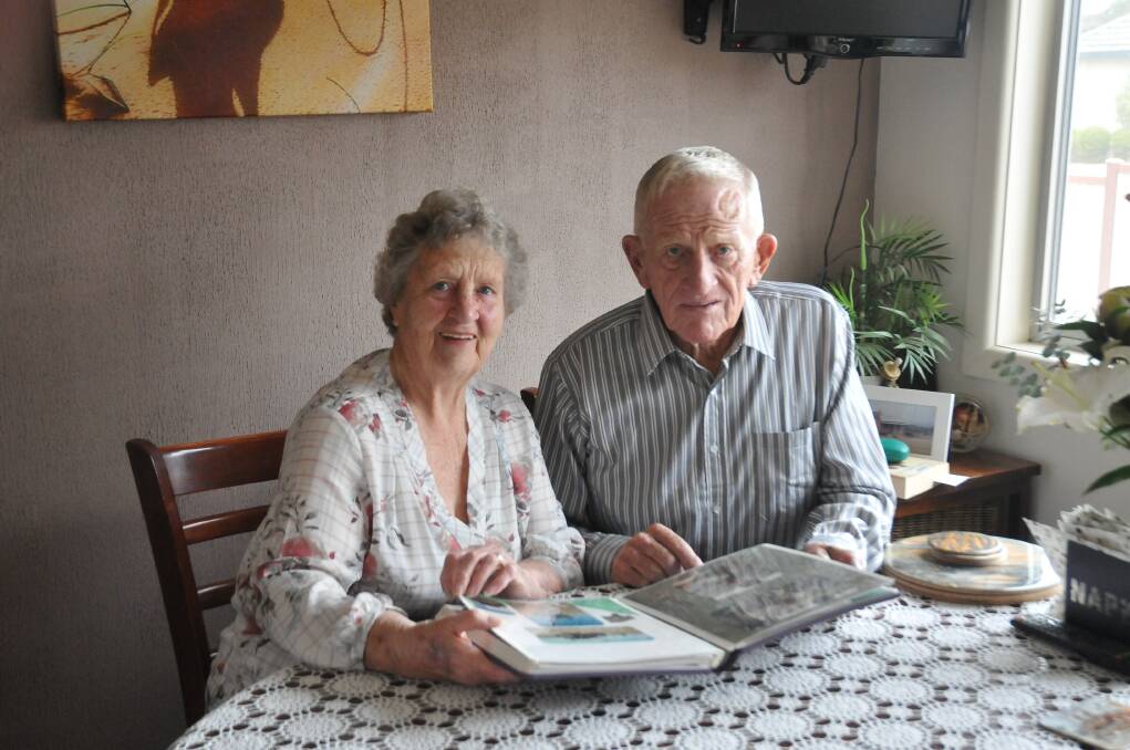 CELEBRATION: Pat and Leon Gibson look back through 60 years of memories of their married life. Picture: CASSANDRA LANGLEY