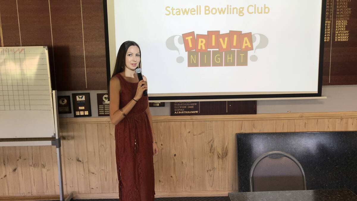 THINKING CAPS ON: Stawell Bowling Club's Jess Cass asks questions at last years trivia night. Picture: CONTRIBUTED