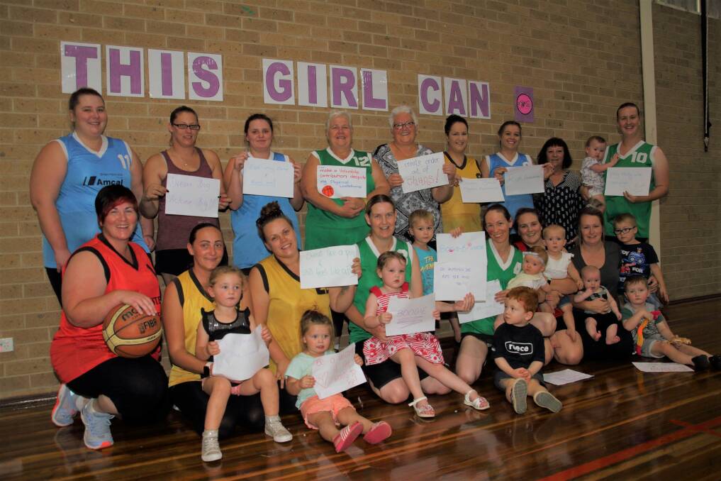 INSPIRING: Stawell Women's Day Basketball players and supporters with their signs for This Girl Can week. Picture: PETER PICKERING