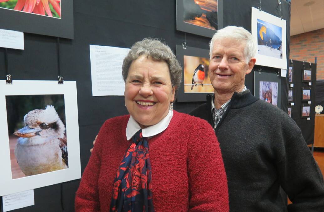 PHOTOGRAPHY: John and Lorraine Simpkin enjoying the photography at last year's exhibition. Picture: CONTRIBUTED
