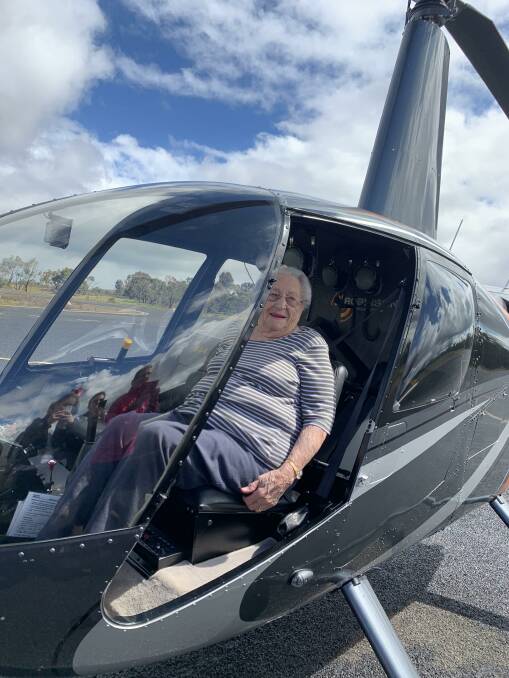 WHAT AN ENTRANCE: Stawell's Betty Smith arrived in a helicopter for her 100th birthday part at North Park on Saturday. Picture: KRISTINE HORROCKS