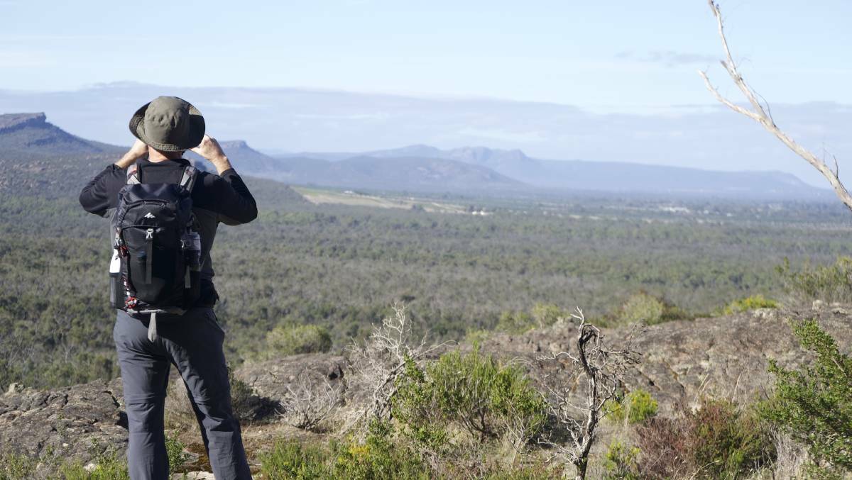 SCENIC LOOKOUT: Grampians Peaks Walking Company owner Adrian Manikas taking a photo. Picture: CONTRIBUTED