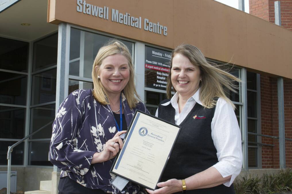RECOGNITION: Stawell Regional Health chief executive Libby Fifis and Stawell Medical Centre's Kim Hinkley with the new accreditation certificate. Picture: PETER PICKERING