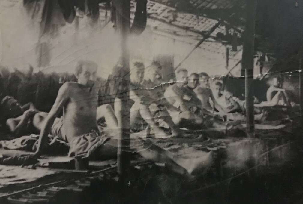 SLEEPING QUARTERS: Stan Illig passed this photo of prisoners of war in the jungle onto his son Robert. 