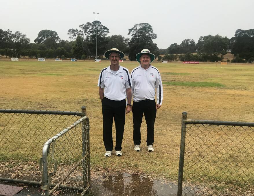 Umpires assessing the ground at Moyston.