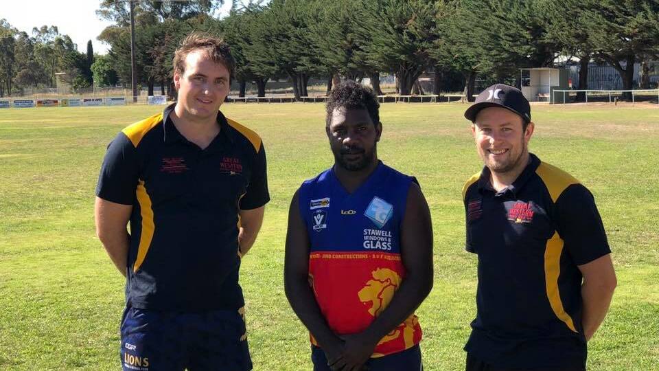 NEW RECRUIT: Nigel Sibson and coach Will Bell with new recruit Bradley Palipuaminni (centre) for the 2019 season. Picture: CONTRIBUTED