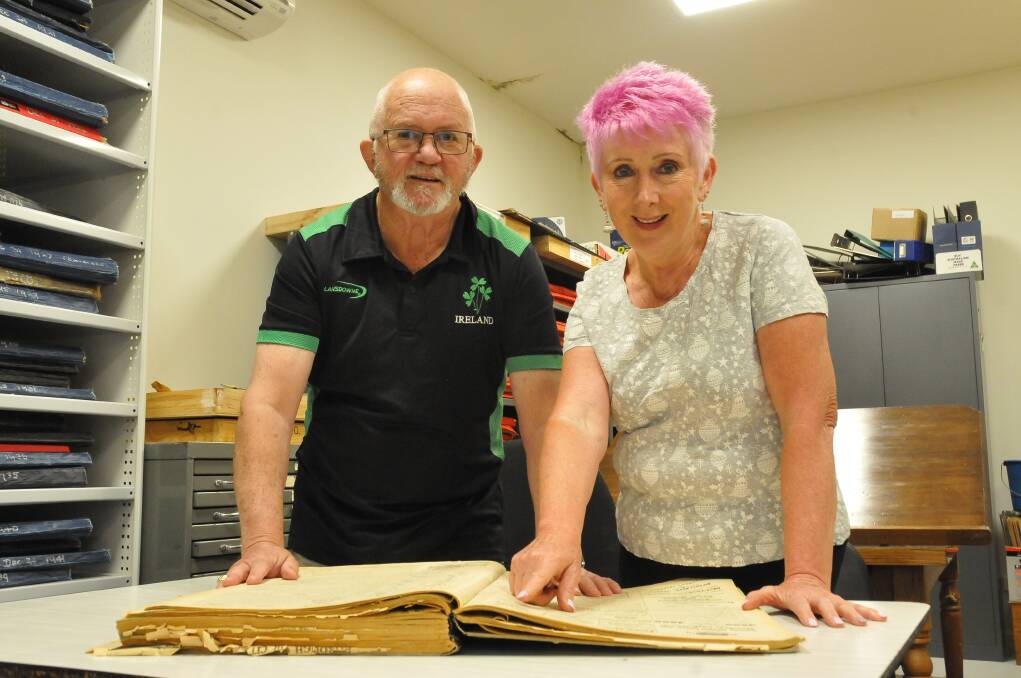 ARCHIVES: Stawell Historical Society Greg Robson and Helen Curkpatrick look through old papers for information. Picture: CASSANDRA LANGLEY