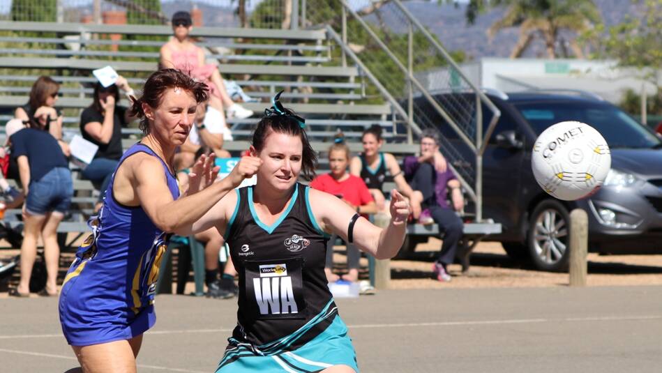 WELCOME BACK: Kristy Dodds in her first game back for the Swifts after 12 months off netball. Picture: TRISH RALPH