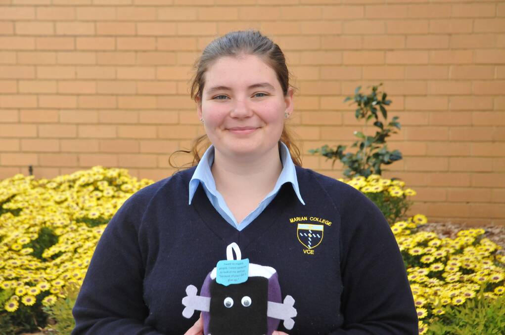 FINALIST: Hayley Little, with one of her "Positivitoy" creations, is one of five finalists in the running for the Youth Affairs Council Victoria 'young people leading change in rural or regional Victoria' award. Picture: CASSANDRA LANGLEY