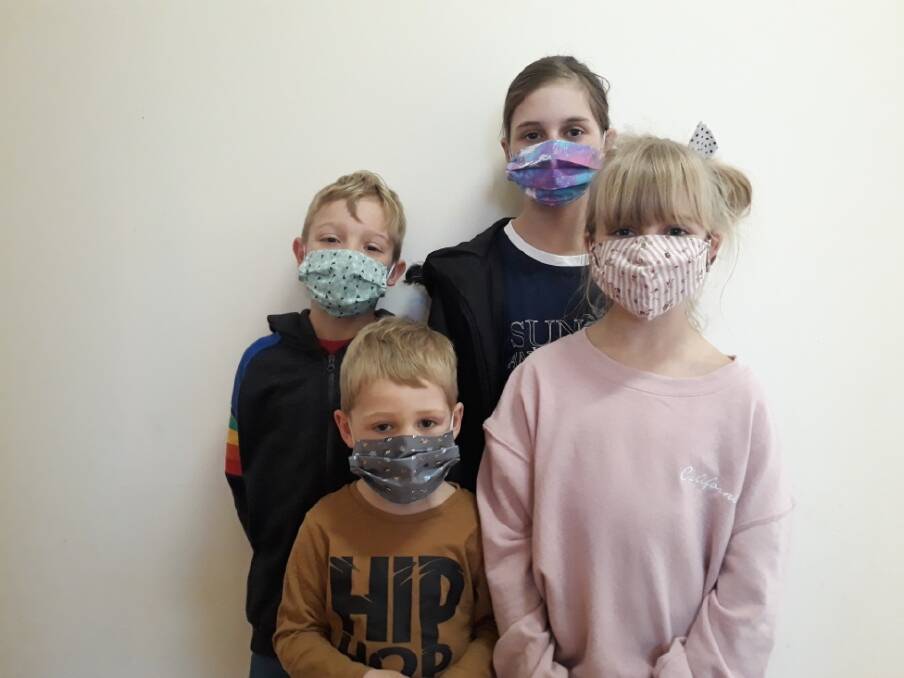 TOGETHER: Tanner, Alfie, Willow and Lolah have chosen to wear masks in public to help the cause. Picture: CONTRIBUTED