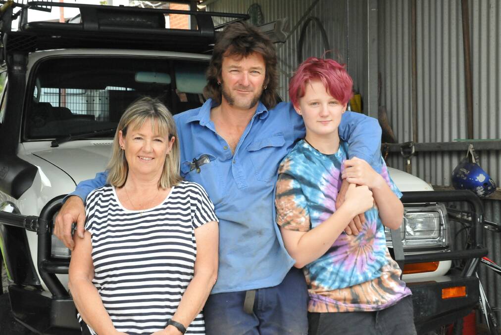 WAITING FOR GREEN LIGHT: Donna, Anthony and Keearna Holden were forced to cut their holiday short and quarantine at home. Picture: CASSANDRA LANGLEY