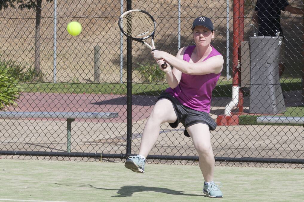 IN ACTION: Jade Cross keeps her eye on the ball during a tennis match. Picture: PETER PICKERING