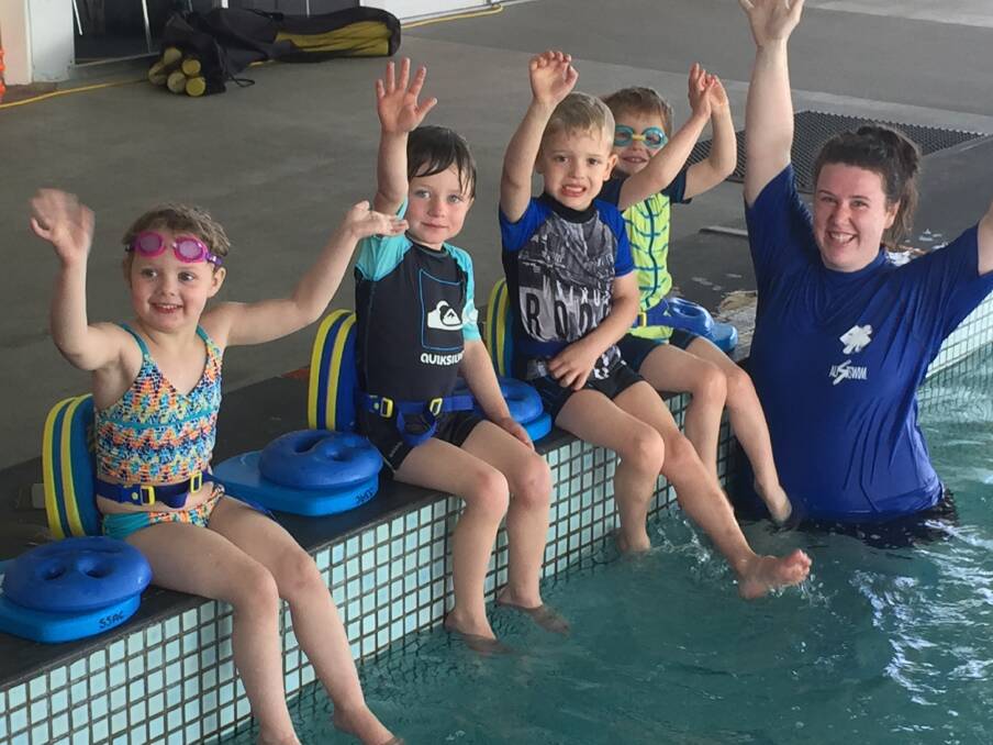 FUN IN THE POOL: Grace, Jerome, Tanner and Thomas enjoying swimming lessons with instructor Tianna Hendy. Picture: CASSANDRA LANGLEY