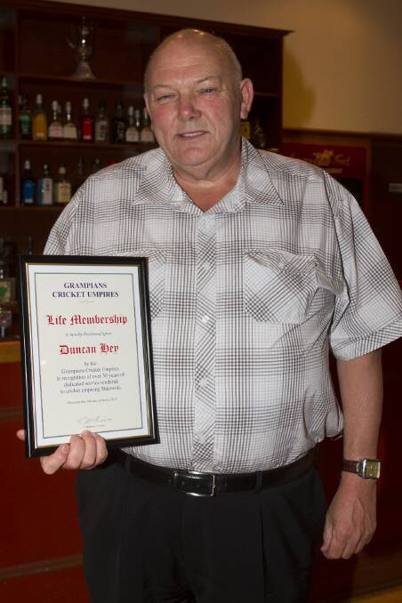 RECOGNITION: Duncan Hey awarded Grampians Umpire Association's life membership.