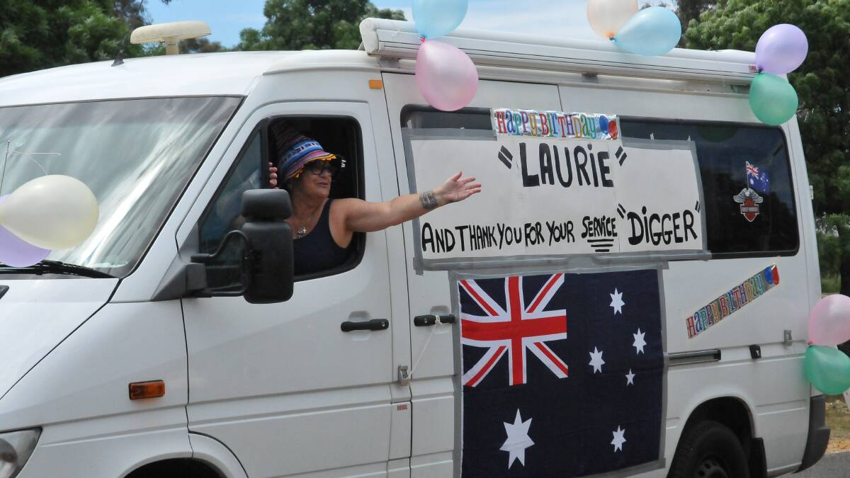 BIRTHDAY WISHES: Family and friends wished Laurie Hannett a happy birthday on Wednesday as they drove past his house. Picture: CASSANDRA LANGLEY