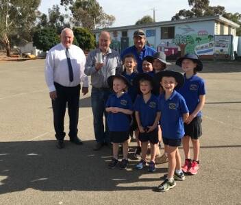 SAYING FAREWELL: Northern Grampians Shire mayor Kevin Erwin, Marnoo Primary School principal Grant Fiedler, School Council president Nigel Slee, Matilda, Hamish, Olivia, Emily, Liela, Charles and Brodie Matthews. Picture: CONTRIBUTED