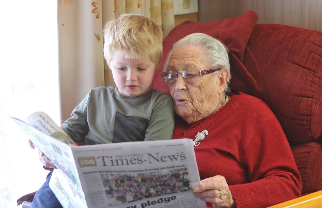 LOVE FOR STORIES: Charlie loves sharing and listening to stories with his great great grandmother Betty Smith at Eventide Homes in Stawell. Picture: CASSANDRA LANGLEY