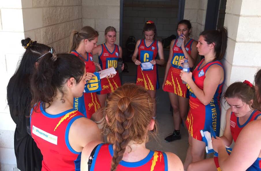 PLAN: A Grade coach Amy Kindred working through plans at quarter time in Allansford. Picture: CONTRIBUTED