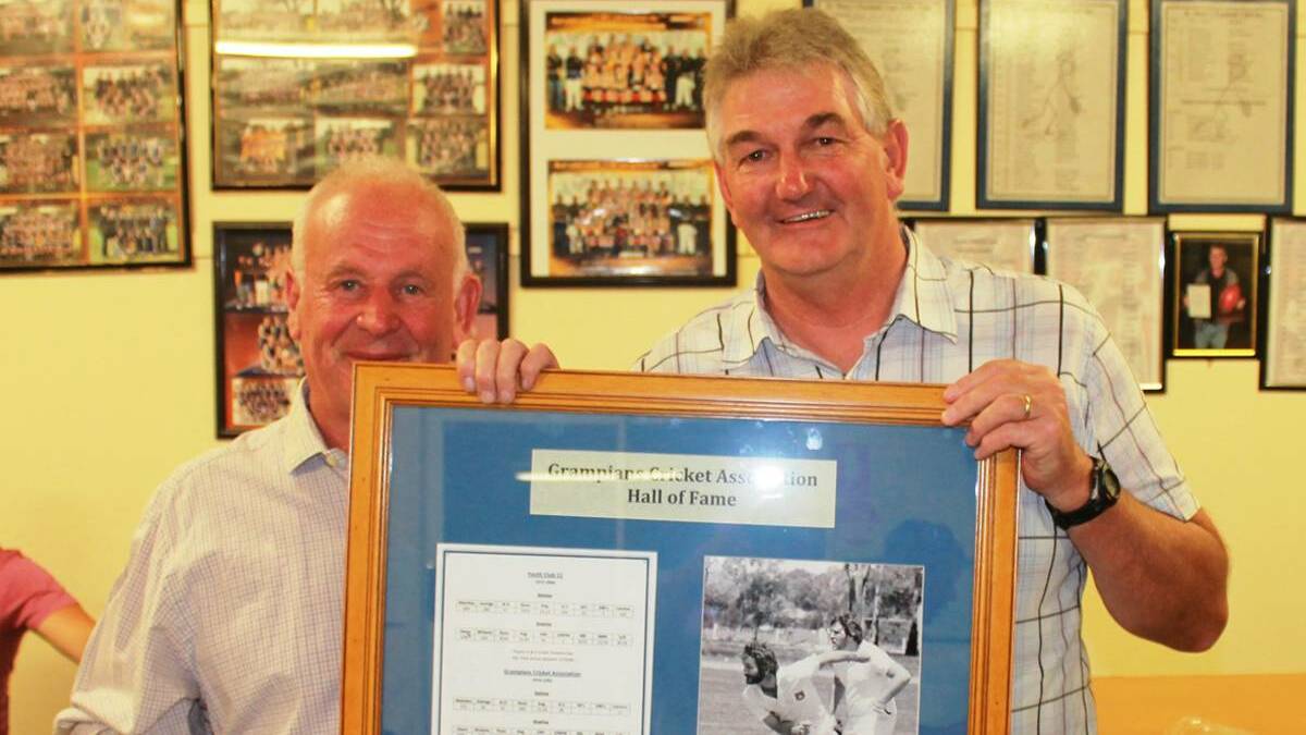 INDUCTEE: Grampians Cricket Association past president Anthony Martin (left) with new Hall of Fame member Peter Homden.