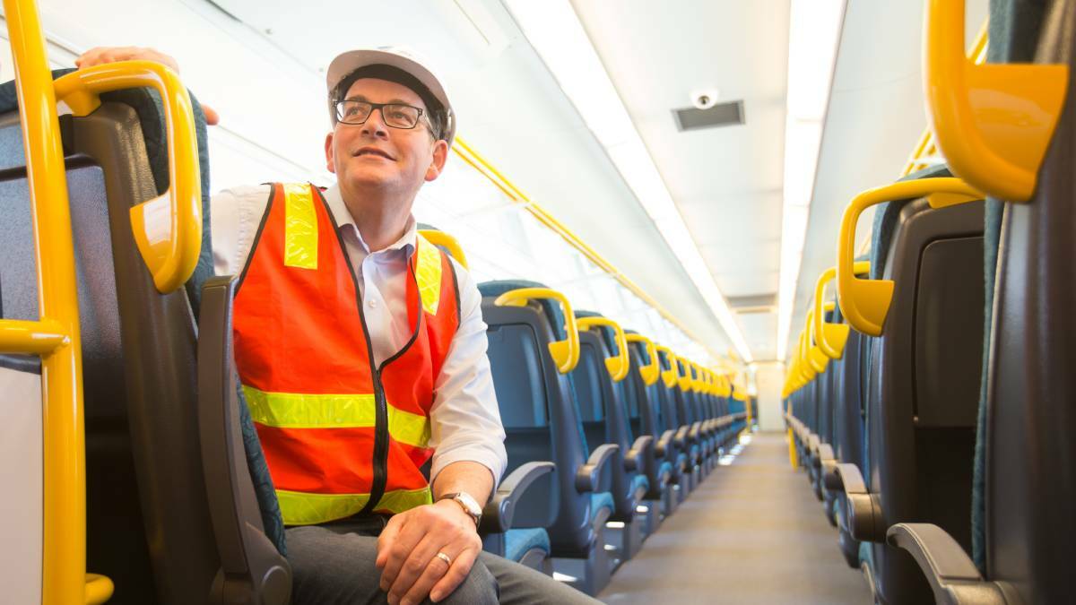 MORE SEATS: Victorian Premier Daniel Andrews on board a new VLocity train at Dandenong manufacturer Bombardier, which has more seats for regional commuters. Photo: SIMON SCHULTER