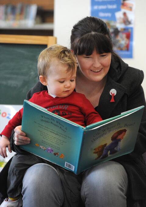Zoe Frew with son Jack Frew, 1, at Rhyme Time at Horsham Library in 2013. 