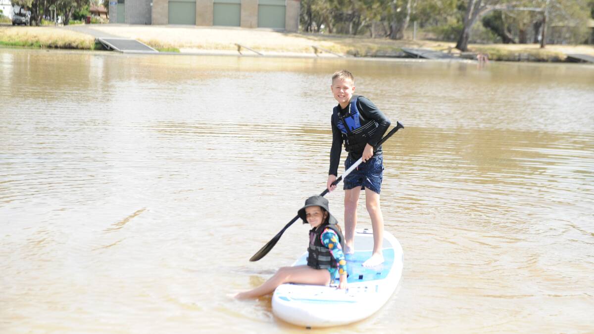 Haven residents Jed and Ella Pohlner on the Wimmera River on Sunday. Picture: ALEX DARLING