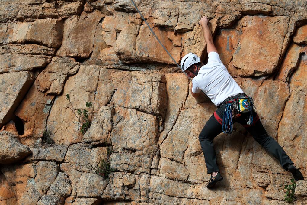 A climber on Castle Crag at Mount Arapiles.
