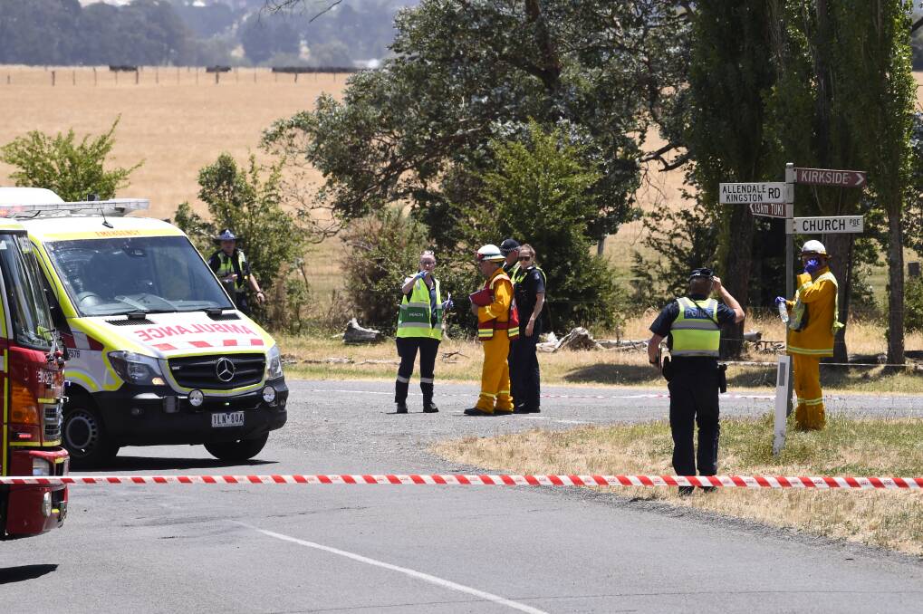TRAGIC: Emergency services at the scene of the crash at Kingston.