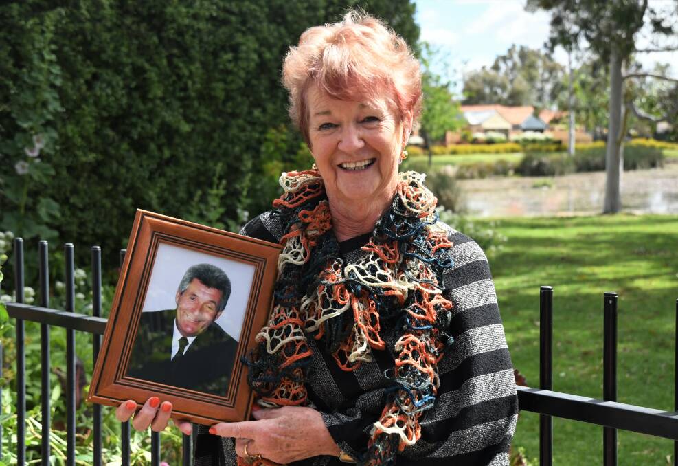 LEGACY: Horsham's Jan Morris, pictured holding a photograph of her late husband Richard, is encouraging people to attend the 16th RM Showcase at the weekend. Picture: JADE BATE