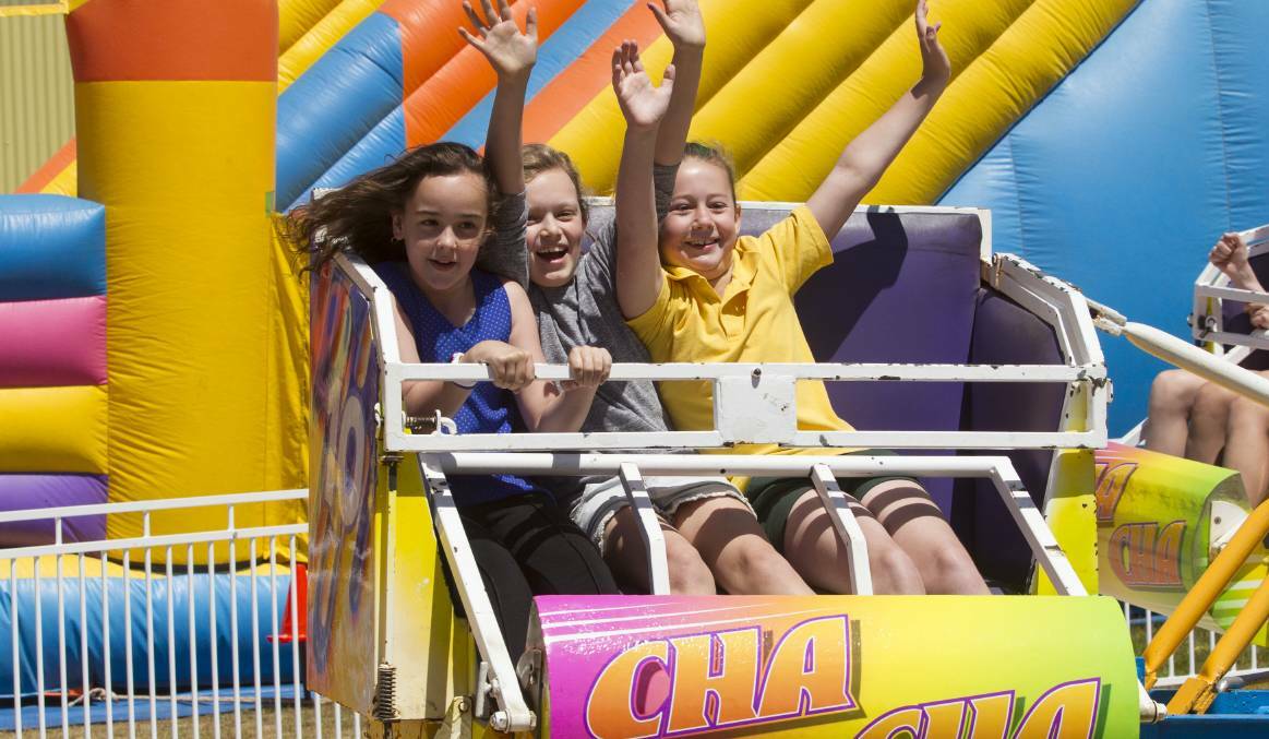 THRILL RIDE: Maddy, Rori and Amelia enjoyed some thrill rides at last year's Ararat Show. Picture: PETER PICKERING