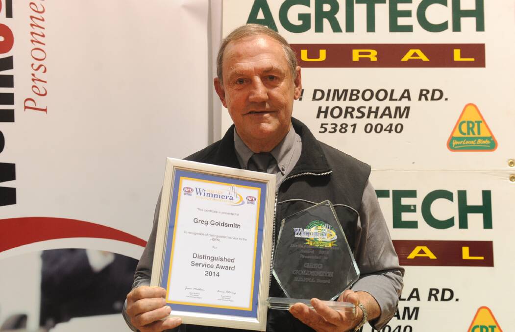 REMEMBERING GREG: Beloved member of the Wimmera community Greg Goldsmith died on Sunday. He is pictured here in 2014 at the HDFNL Best and Fairest Count after he received a Distinguished Service Award.