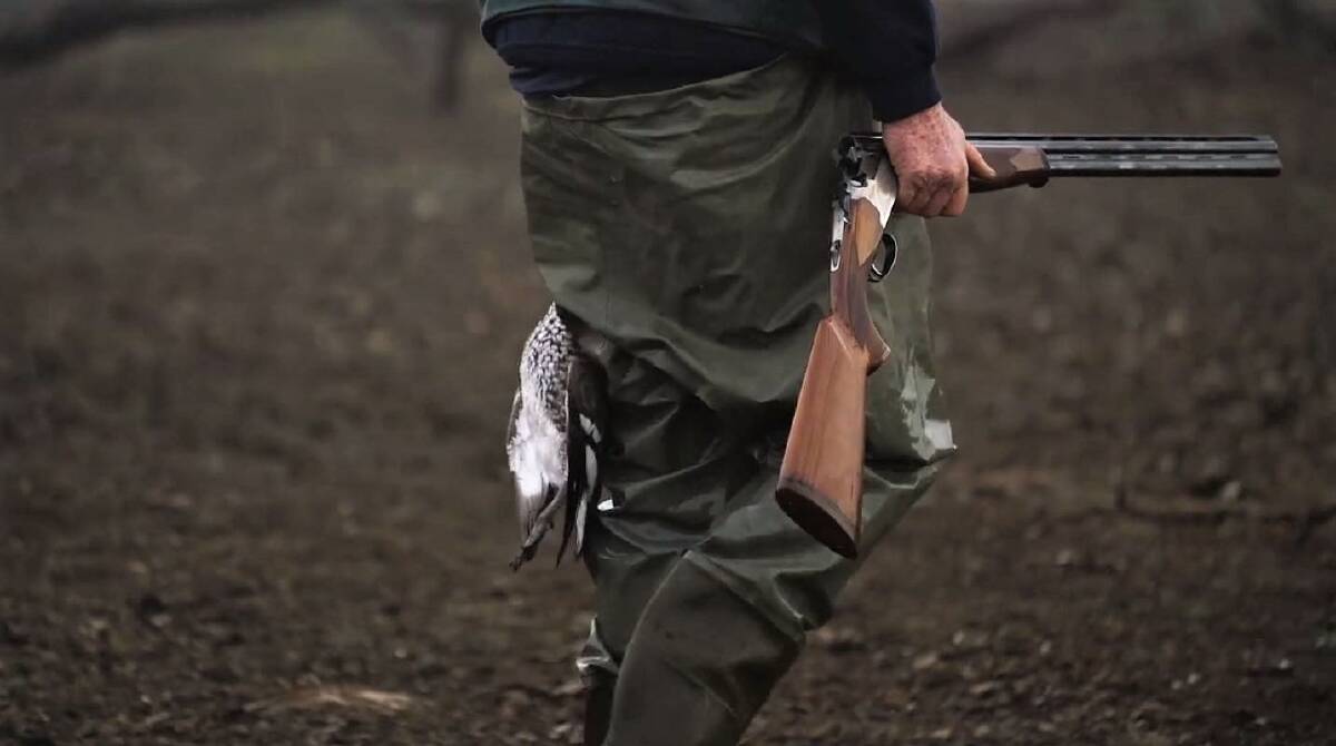 CALL TO END THE HUNT: A still from one of the campaign's four television advertisements shows a duck hunter with a duck carcass and a shotgun. Picture: CONTRIBUTED