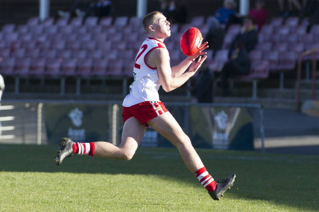QUICK: Cooper Heard makes a run down the mid-field in the Round 11 match against Nhill. Picture: PETER PICKERING. 