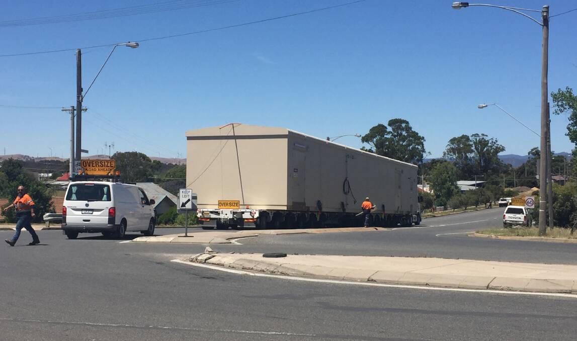 OVERSIZED: The driver is finally through the intersection and moving along the Pyrenees Highway.