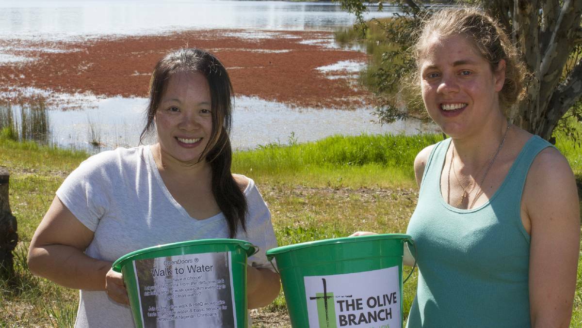 GENEROUS: Anita Wong and Heidi Gellert from The Olive Branch Church's event in 2017. Picture: PETER PICKERING.