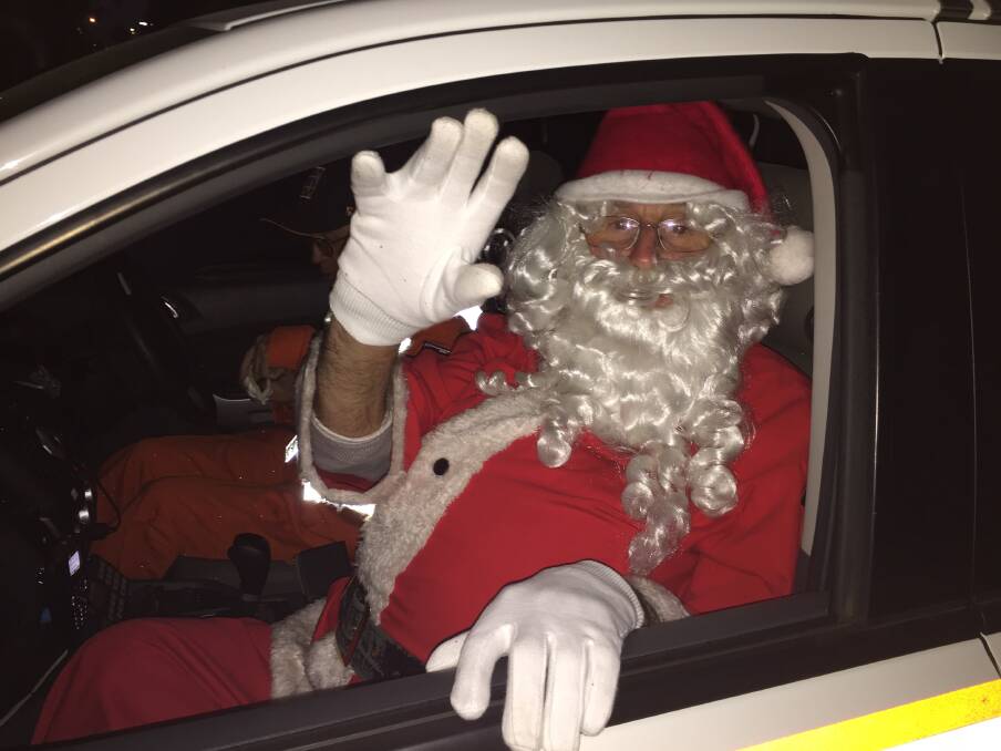 MERRY: Father Christmas will make his way around Ararat and Stawell this weekend. Picture: JESSIEANNE GARTLAN.