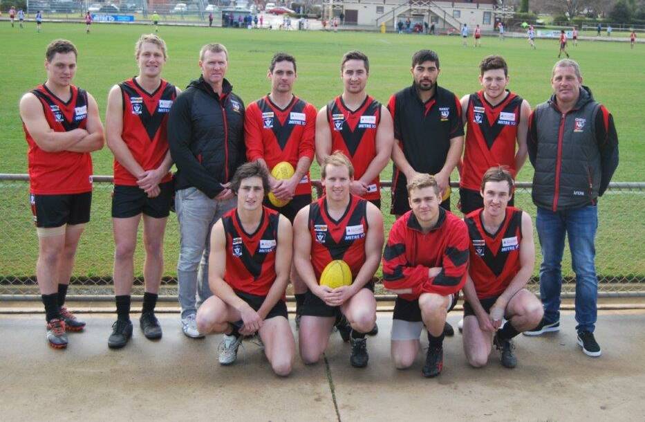 COMMITTED: Stawell players and coaches with president Tim Williams (far right). Picture: Stephen Walker.