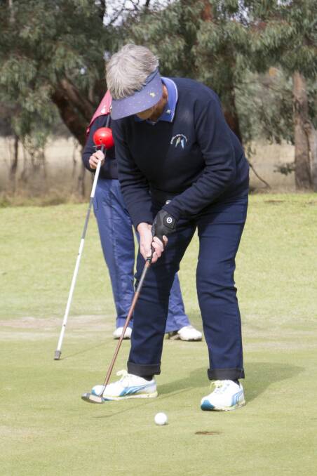 REWARDED: Lyn Willcock putting to victory. Willcock has been competing in the Stawell Club Championships for eight years. This is her first win. Picture: Peter Pickering.