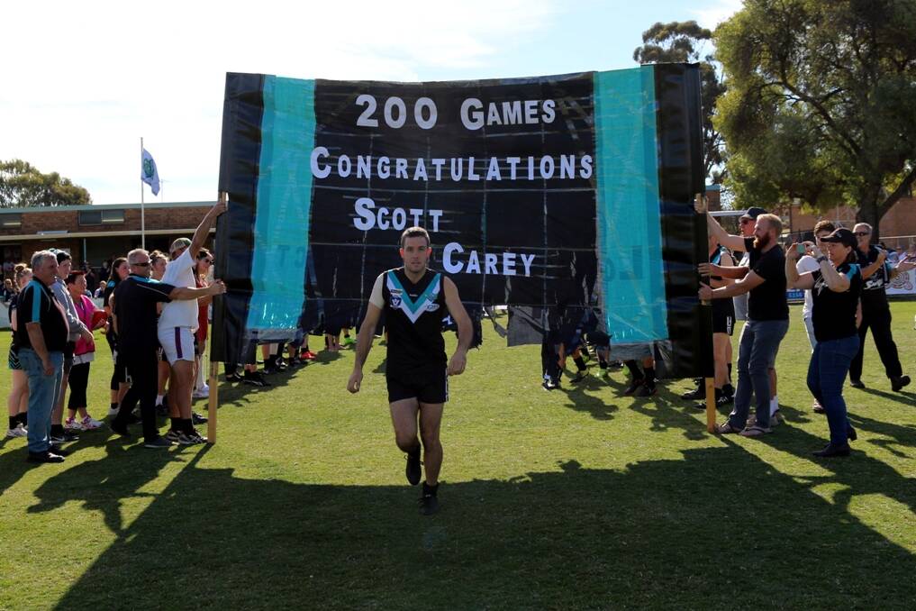 Scott Carey runs out for his 200th game. Picture: Trish Ralph