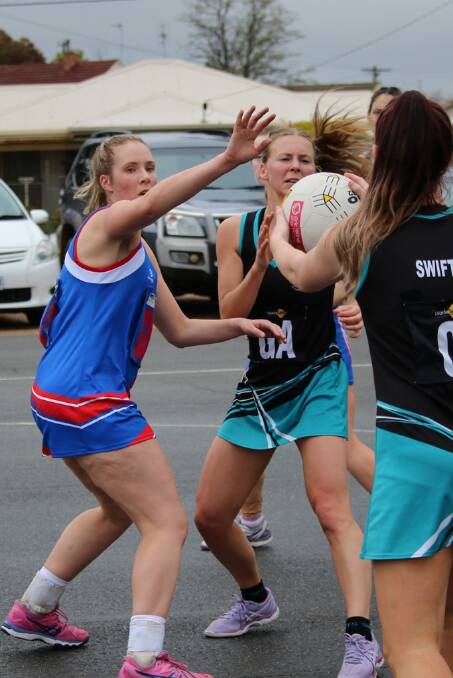 IN BOUND: Jade Cleary receives a pass from Courtney Morrow. Cleary was among the Baggies' best players in their win over Jeparit Rainbow. Picture: Trish Ralph. 