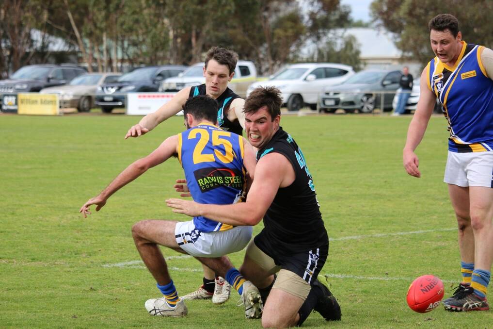 RIVALRY: Matt Healy applies a tackle for Swifts in last year's thrilling elimination final against the Rams. Picture: Trish Ralph.