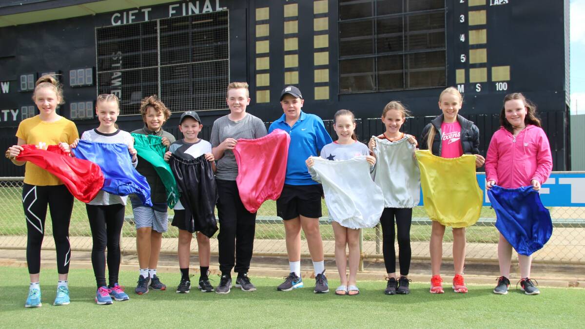 READY: Colour kids learn about the role they will play at the Stawell Gift carnival over the Easter weekend. Picture: LACHLAN WILLIAMS