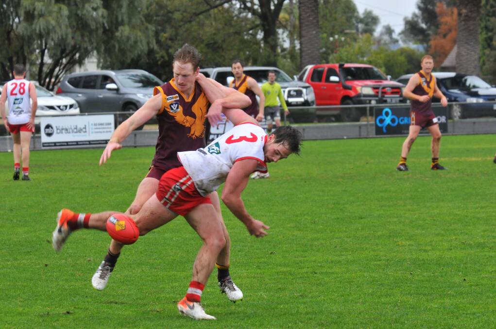 Nick Mendes fights to keep his footing. Picture: WARRACKNABEAL HERALD