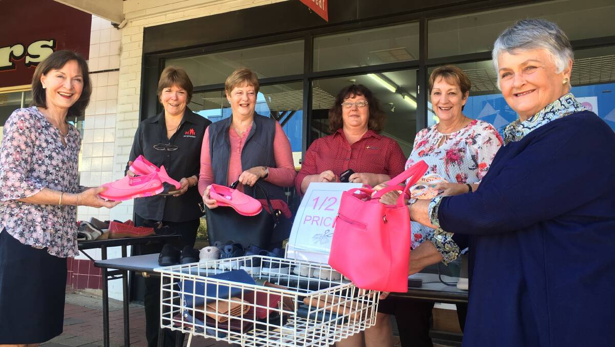 Meg Blake (far right) promoting Stawell Y-Zetts' 2018 shopping spree to raise funds for local businesses and Stawell Regional Health. Picture: LACHLAN WILLIAMS