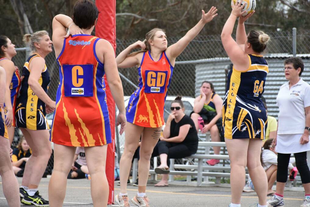 LEADING BY EXAMPLE: Great Western coach Amy Kindred applies defensive pressure against her Hawkesdale-Macarthur opponent. Picture: Sharon Basset.